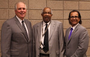 Dr. Whitney Harris poses with President Rich Wagner and Dr. Leo Parvis