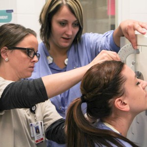 Clinical Instructor Amanda Barker works with Rad Tech students on site at North Memorial Hospital.