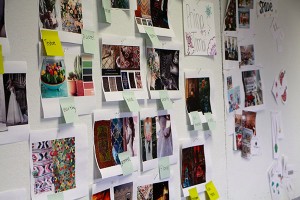 Photo of a "brainstorming wall" where campers posted ideas, graphics, notes for design inspiration. 