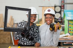 Photo of girls holding power tools