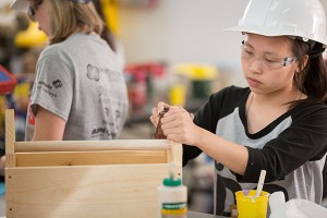 Photo of girl building in the construction lab