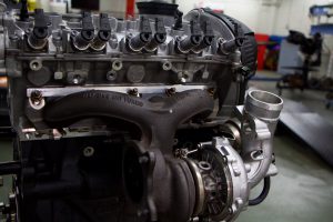 A close-up of an Audi vehicle’s engine, recently donated to Dunwoody College