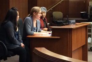 Hertel testifying in Minnesota State Legislature with MN Representative and Bill Author Ilhan Omar 
