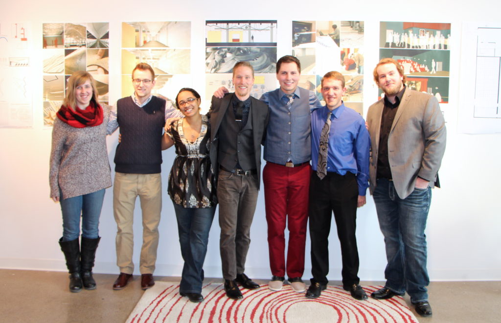 Several Dunwoody Architecture graduates at a final project presentation in 2015.
