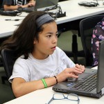 Photo of student on computer