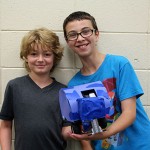 Photo of students with robot