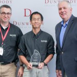 Pictured from left to right: Dean of Robotics & Manufacturing E.J. Daigle, Instructor Alex Wong and College President Rich Wagner