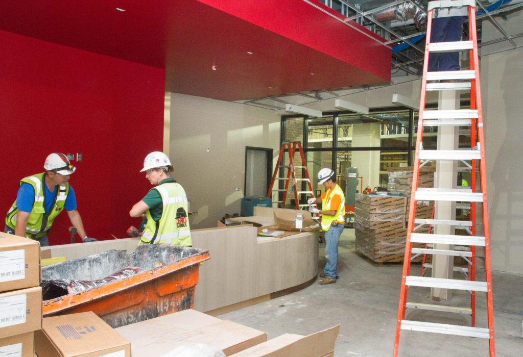 Image of the new welcome desk under construction.