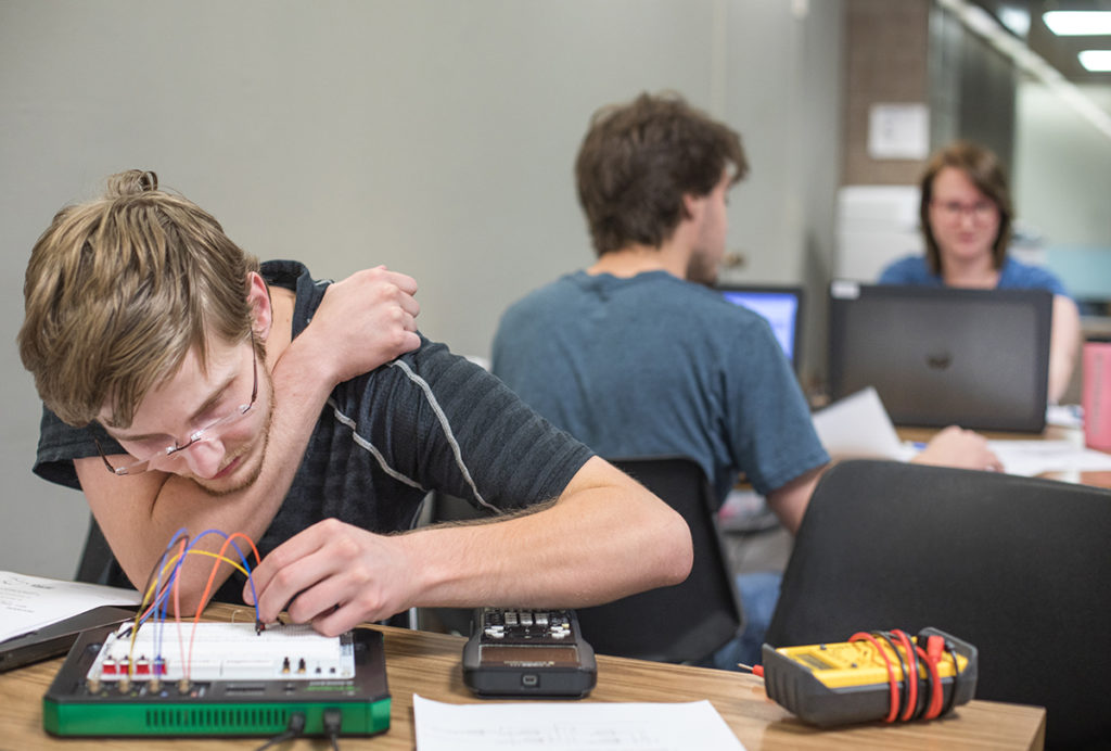 Electrical Engineering students work on projects in  the new School of Engineering Projects Lab. 