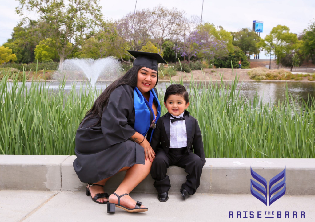 Photo of a woman and child from a Raise the Bar partnership program. 