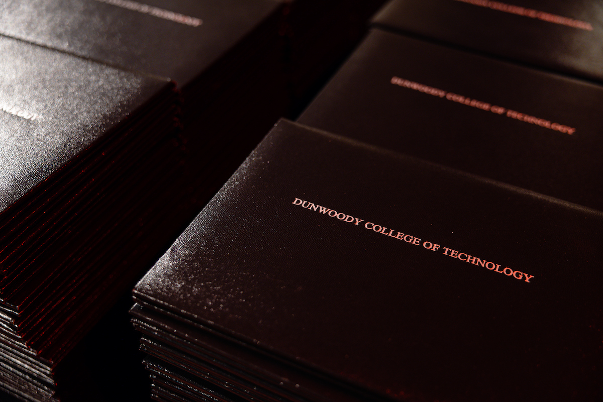Dunwoody College of Technology diploma covers for Commencement