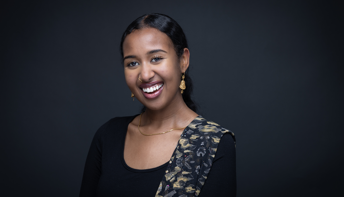 Portrait of Halima Yassin, smiling.
