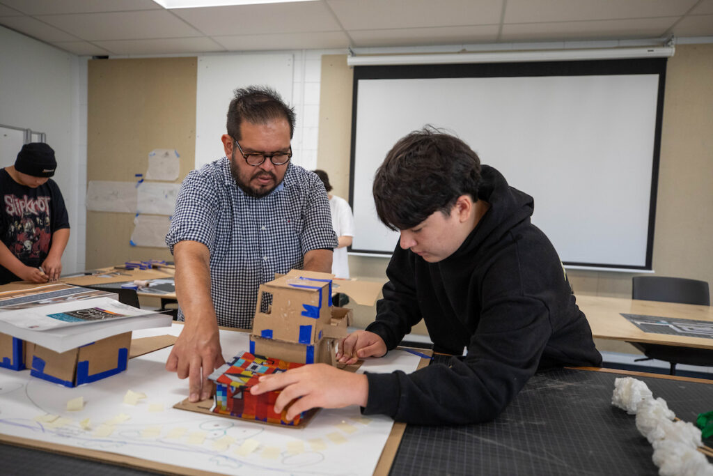 A camper works on his project during the Indigenous Design Camp held at Dunwoody College. 