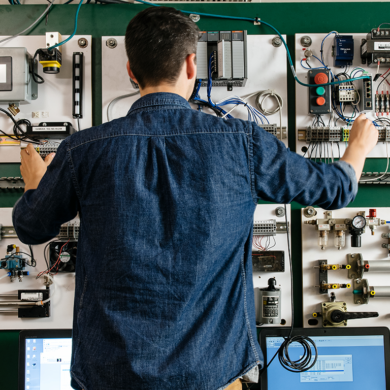 Student using industrial control board