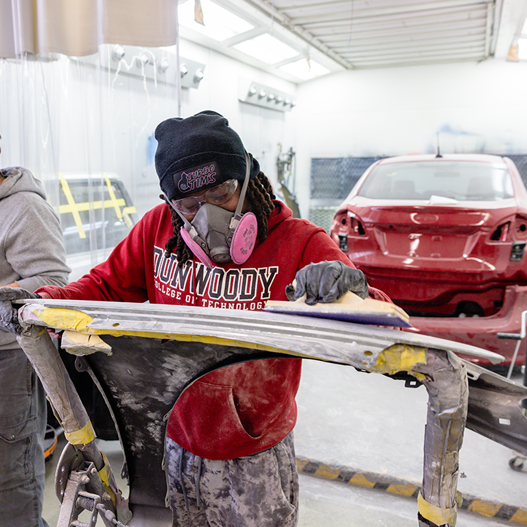 Automotive Collision student in lab.